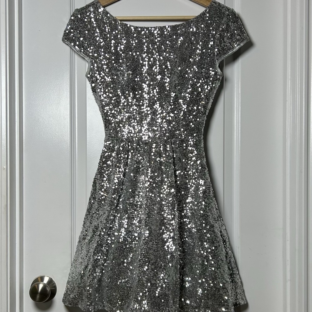 B. Darlin Silver Sequin Cap Sleeve Deep V Back Fit & Flare Homecoming Dress